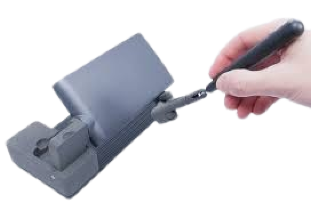 MinVerse compact haptic device held in hand